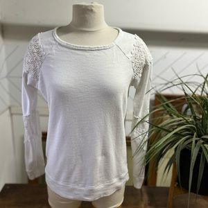 Crochet patched long sleeve top. Unknown brand or size fits a M-L.